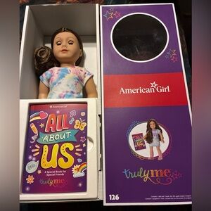 American Girl Doll with Multicolor Top and Book
